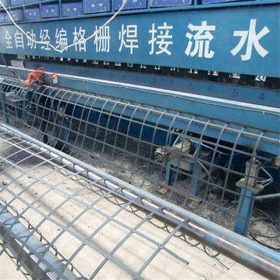 现货玻纤土工格栅 沥青路面加筋自粘式EDA玻璃纤维50kn土工格栅